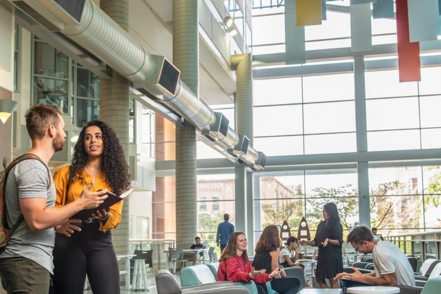 Students inside the University of Manitoba Bannatyne campus Buhler Atrium.