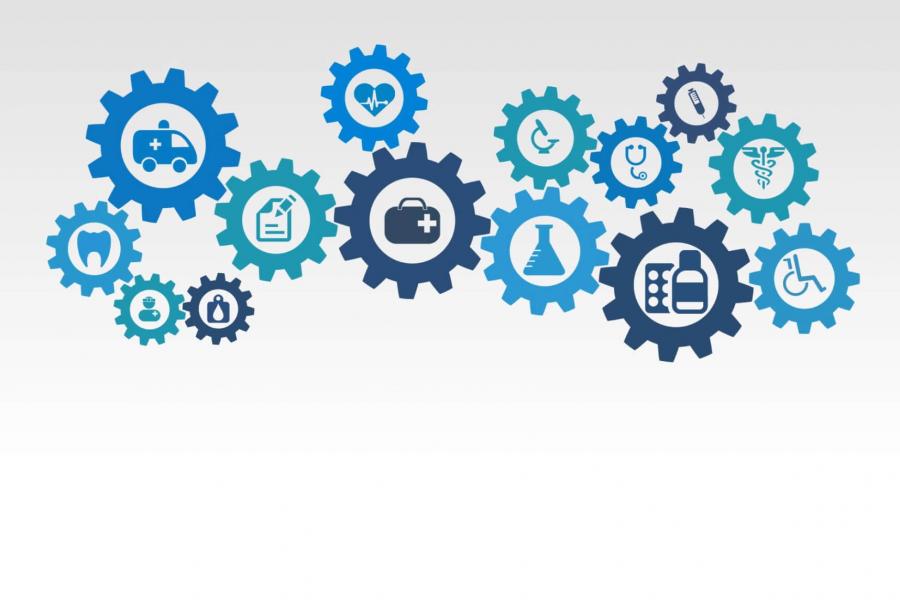 An illustration of connected blue coloured gears with icons inside of each representing different medical fields. 