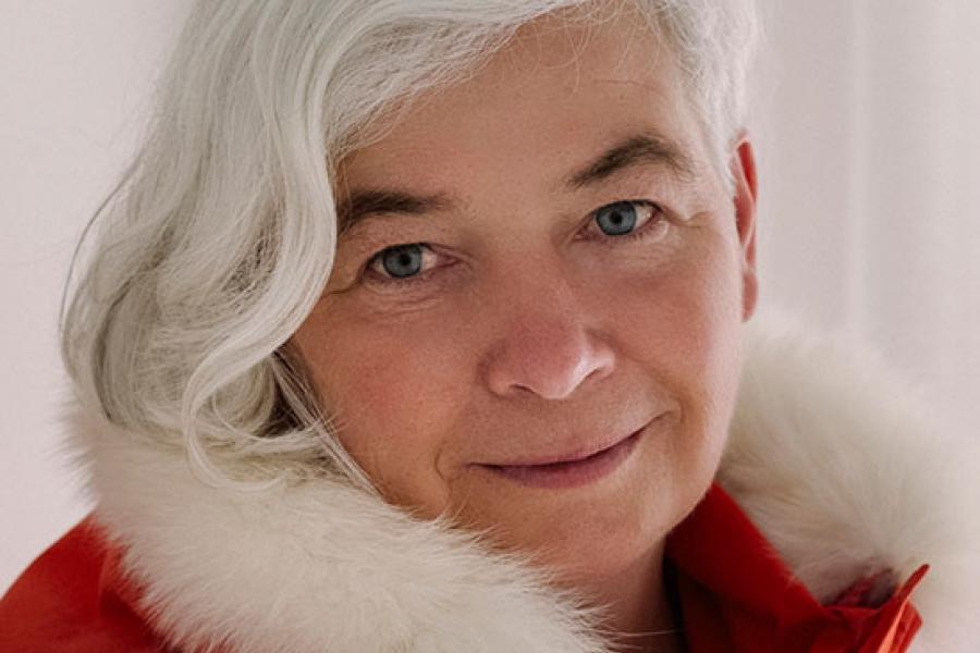 Portrait of Dr. Dorthe Dahl-Jensen in a heavy winter coat with fur trim.