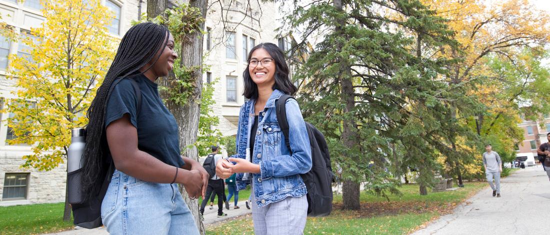 Image of two female students on campus.