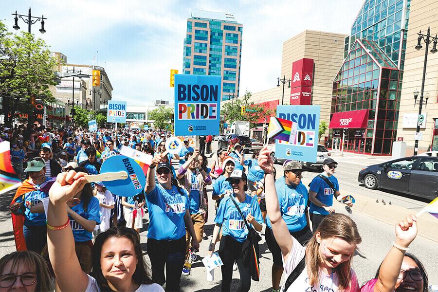 Image of students, staff and faculty at the Winnipeg Pride Parade. 