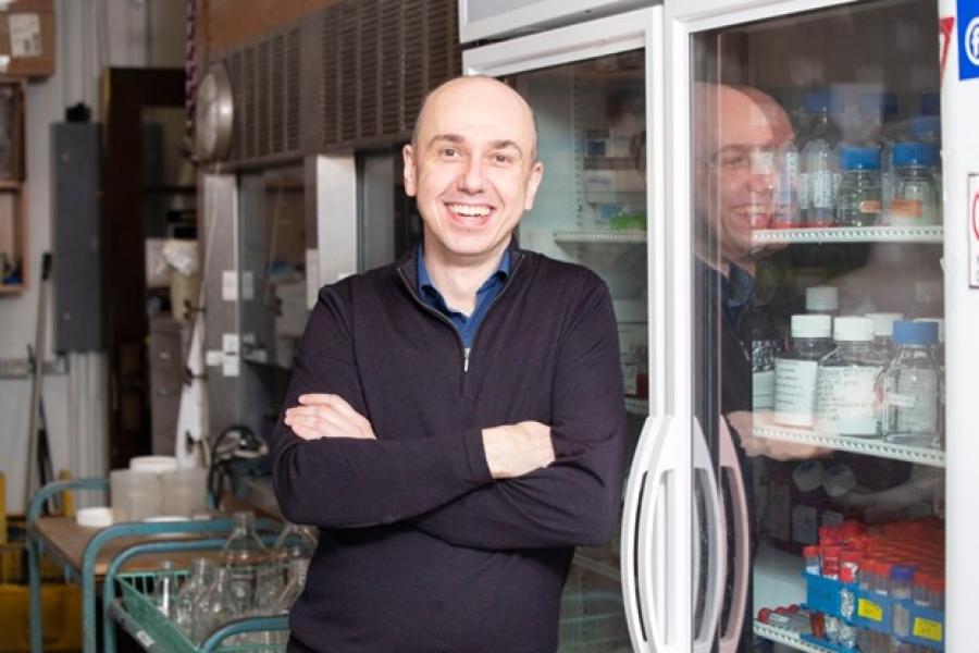 Peter Pelka smiles in his lab.
