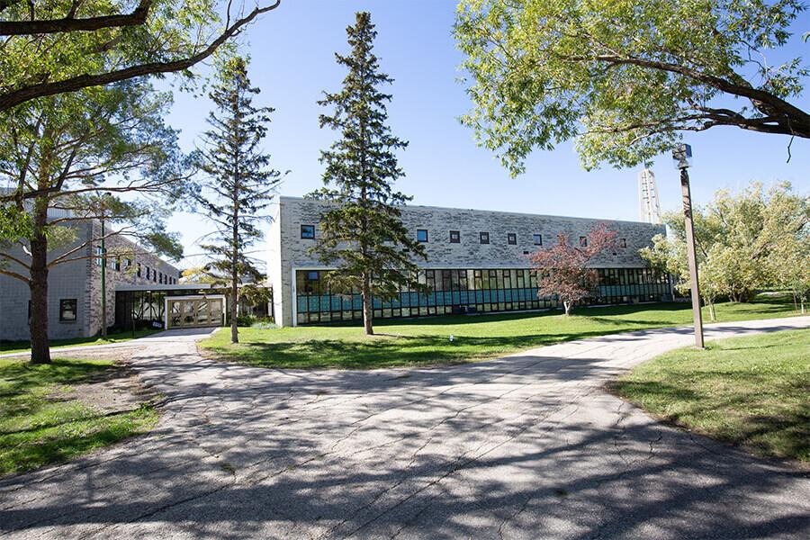 Exterior of St. Paul's college, a limestone building on the Fort Garry campus.
