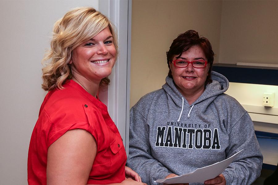 A UM staff getting assistance.