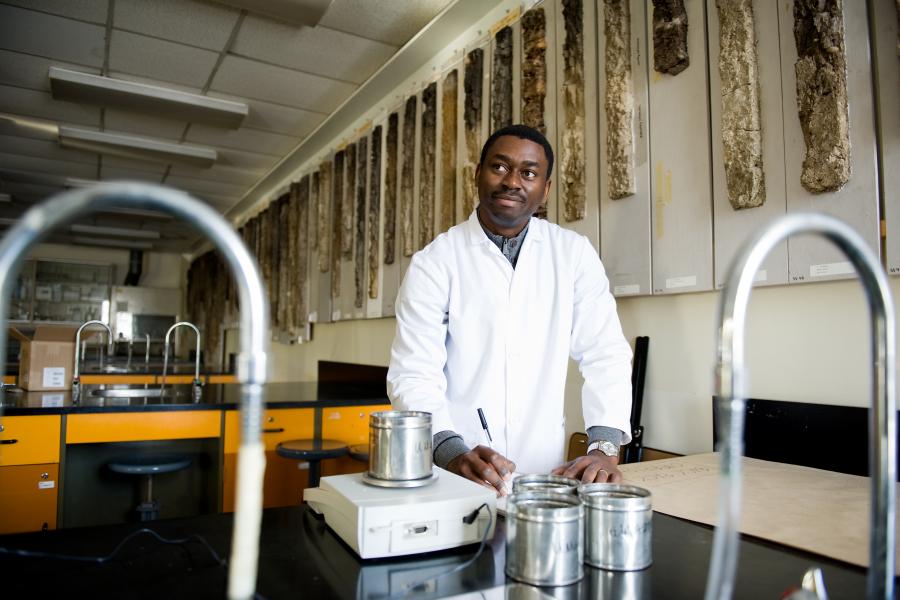 Male graduate student in a lab.
