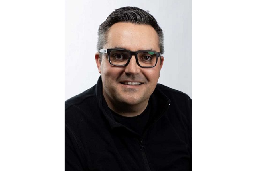 Director of Indigenous Leadership Program, Justin Rasmussen's headshot.