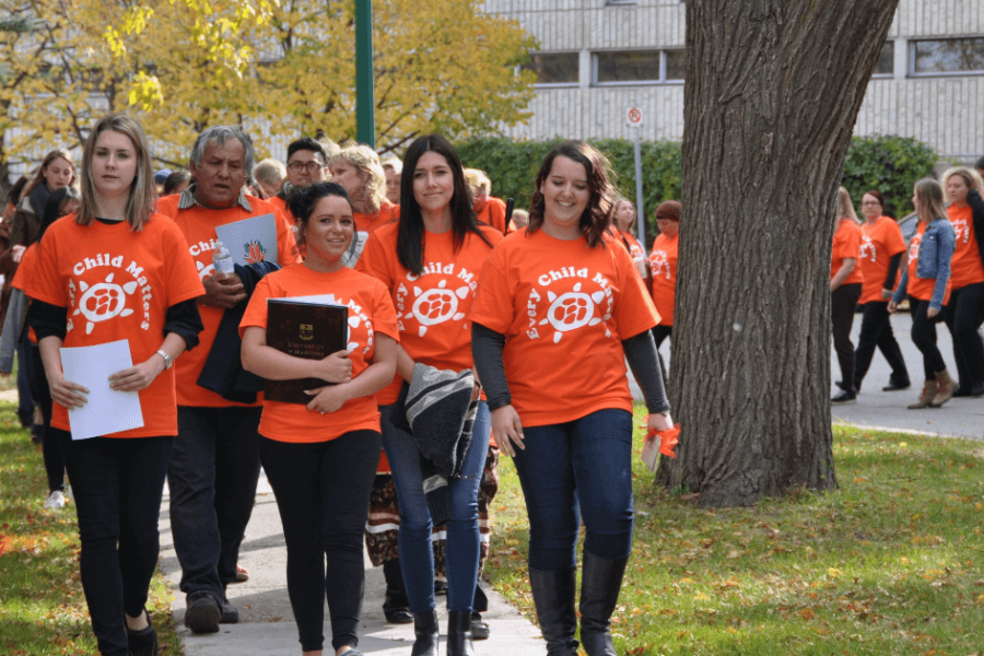 students walking outside for orange shirt day